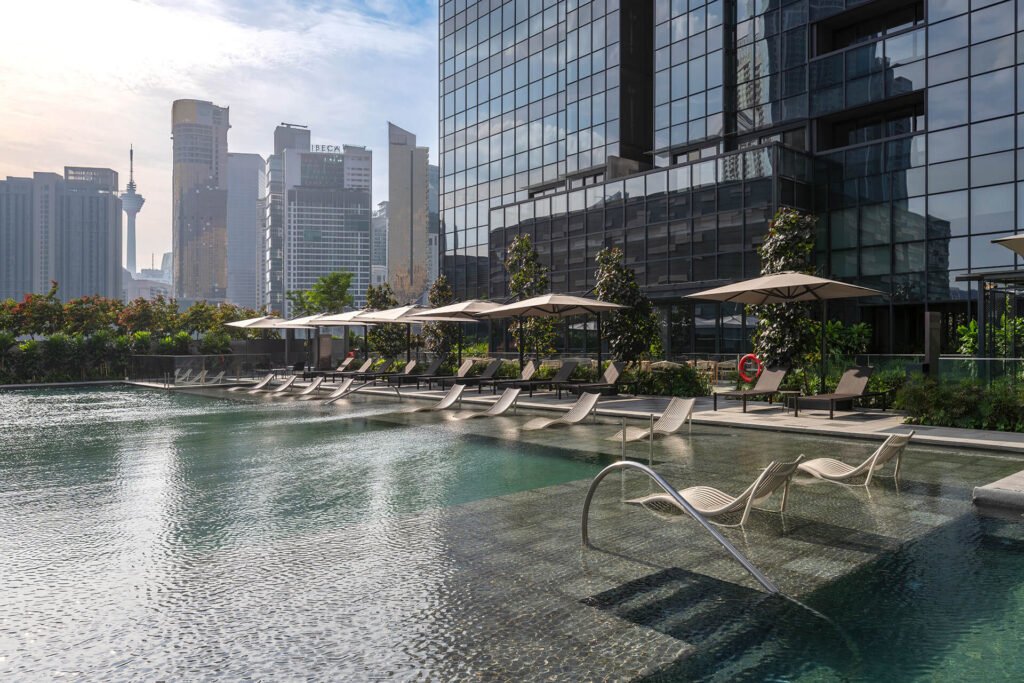 Pool deck with the city skyline, TRX Residences