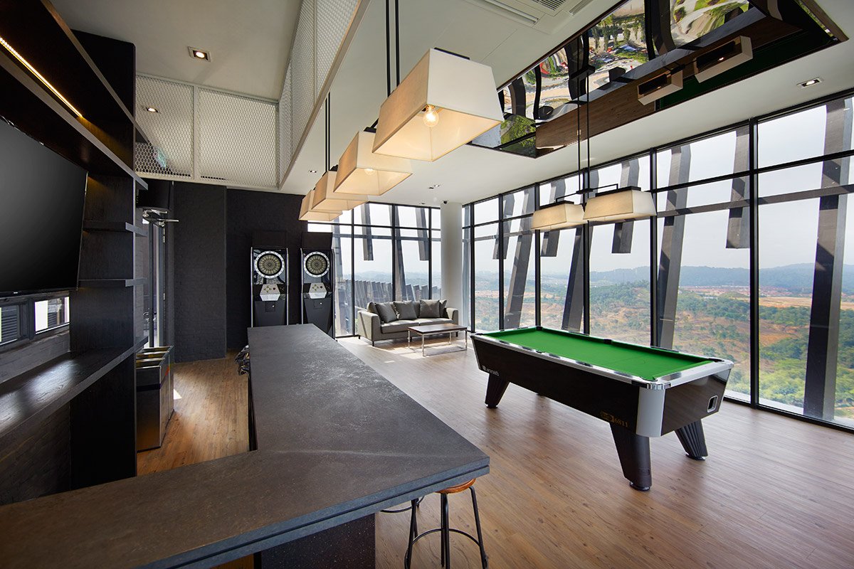 Residents' lounge with games table at Twin Arkz